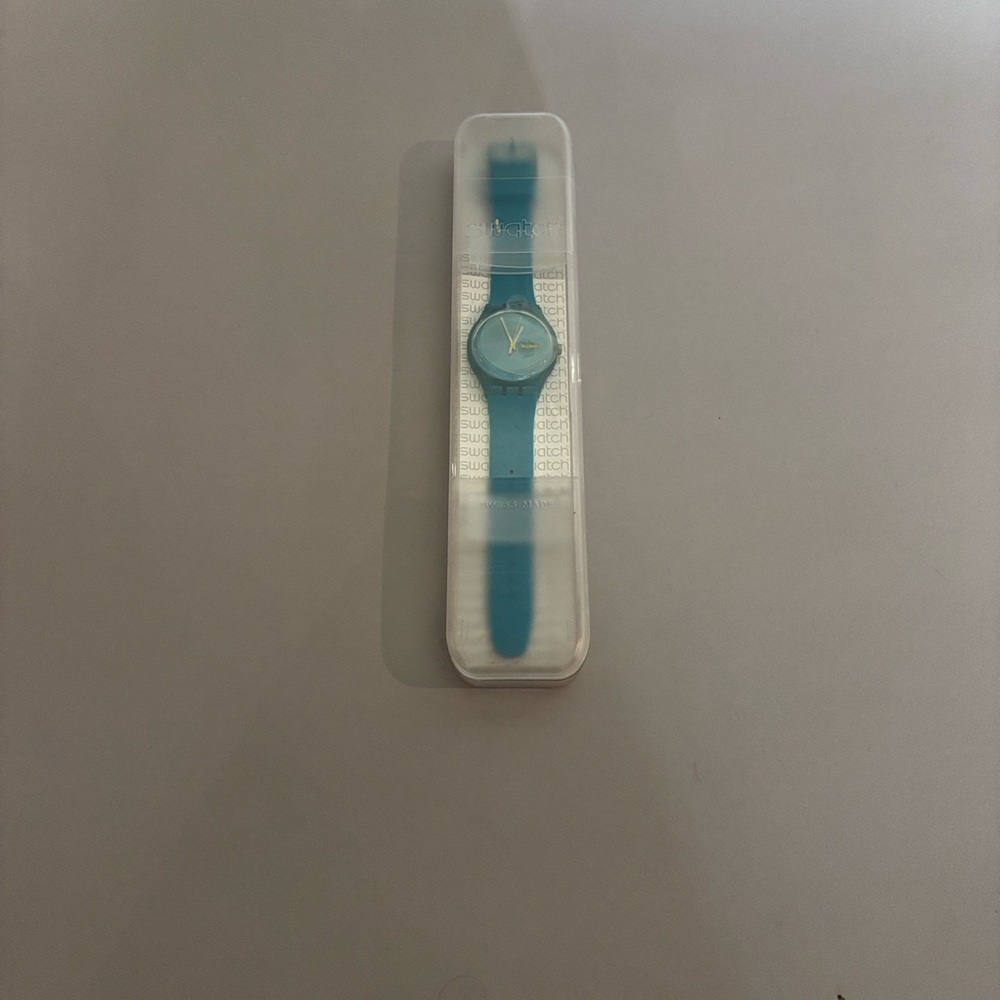 Swatch Turquoise Watch with White Accents